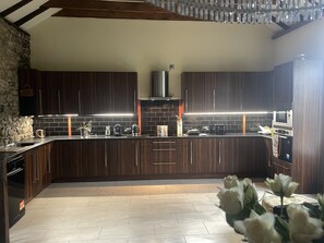 Large kitchen with 6 person dining to the rear 