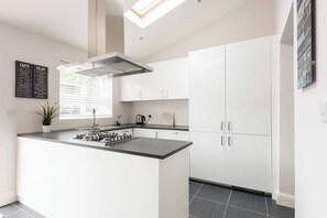 Fridge, cookware/dishes/utensils, spices, freezer - Luxurious New Apartment (Greater London)