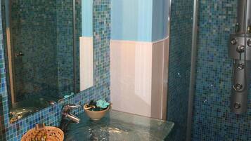Shower, jetted tub, hair dryer, bidet