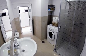 Hair dryer, towels, soap, shampoo