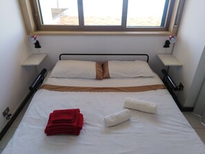 2 habitaciones, tabla de planchar con plancha y acceso a internet