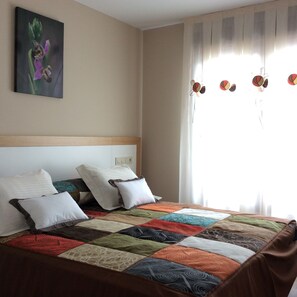 2 habitaciones, tabla de planchar con plancha y wifi gratis 