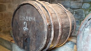 A wooden barrel with the inscription "CONDE-A" and the number "2" on it. - Casa Douro Terrace -River Views Douro Valley 60' from Porto  (Ancede - Baião)