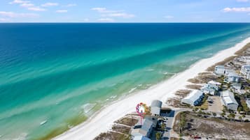 On the beach, sun loungers, beach towels