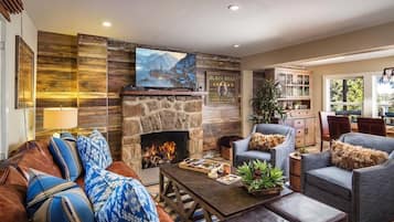 TV, fireplace, books, stereo