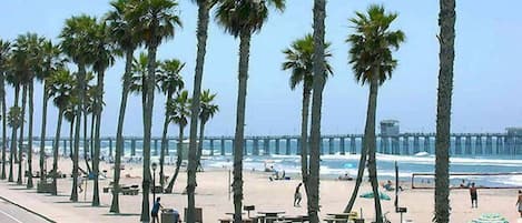 On the beach, sun loungers, beach towels