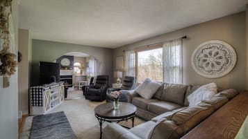 Smart TV, fireplace, DVD player, books