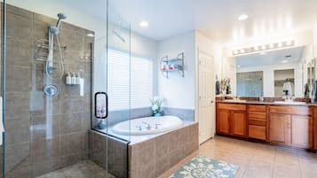 Combined shower/tub, hair dryer, towels, soap