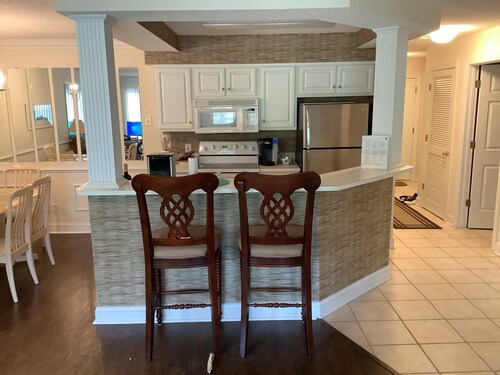 FIVE STAR REVIEWS! QUEEN BEDS! Updated Condo with new Pergo Floors