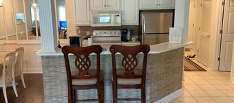 FIVE STAR REVIEWS! QUEEN BEDS! Updated Condo with new Pergo Floors