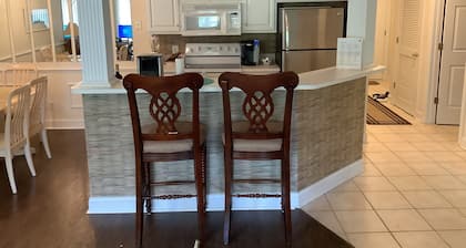 FIVE STAR REVIEWS! QUEEN BEDS! Updated Condo with new Pergo Floors