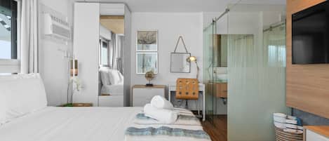 1 bedroom, desk, iron/ironing board, travel crib