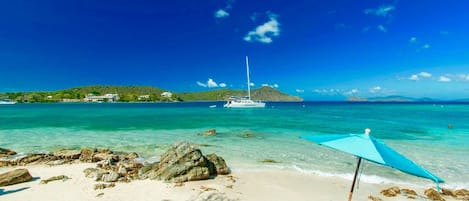 On the beach, sun loungers, beach towels