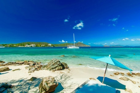 On the beach, sun loungers, beach towels. Renovated Amazing Waterfront Escape: Balcony, Paradise At A Great Price!