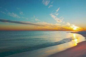 On the beach, sun loungers, beach towels