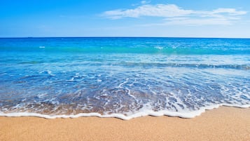Beach nearby, sun-loungers, beach towels