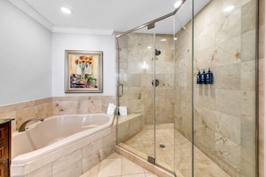Bathtub, hair dryer, towels, soap