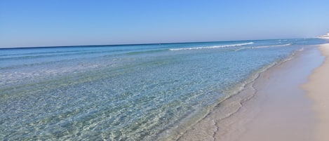 On the beach, sun loungers, beach towels