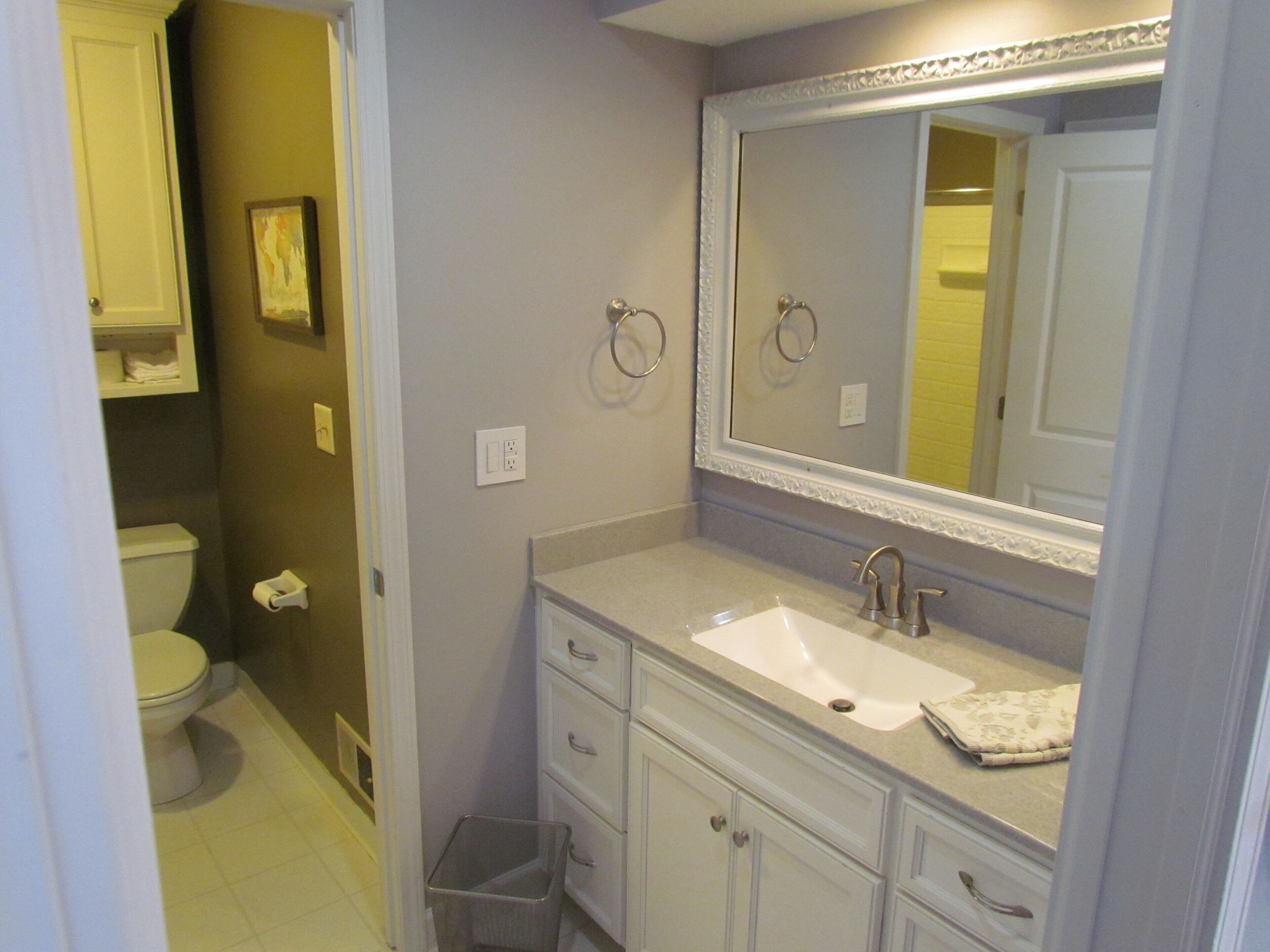 Combined shower/tub, hair dryer, towels, soap