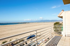 On the beach, sun loungers, beach towels