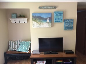 Smart TV, DVD player, books, music library