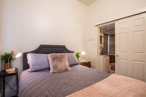 1 bedroom, desk, iron/ironing board, travel cot