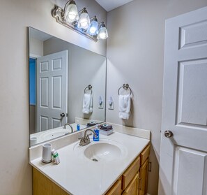 Combined shower/tub, hair dryer, towels, soap