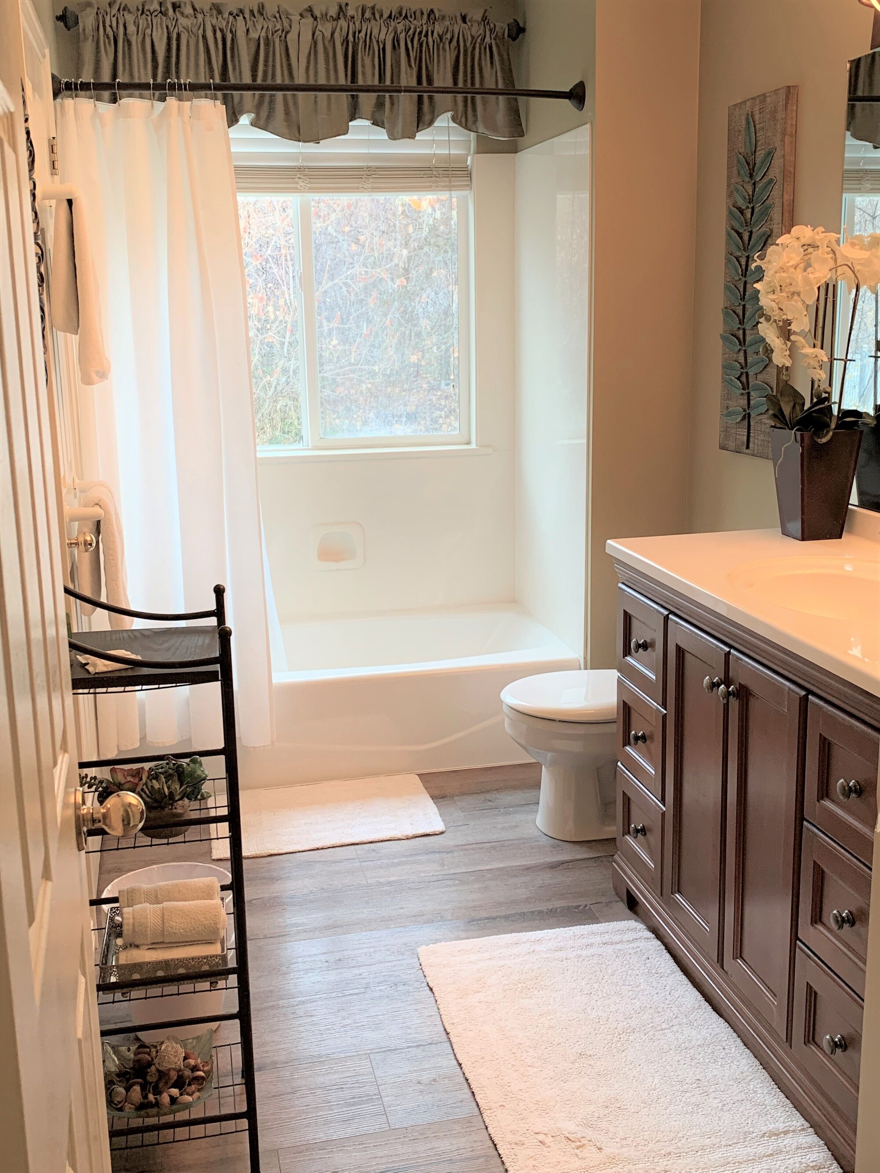 Bathtub, hair dryer, towels, soap