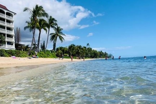 On the beach, sun loungers, beach towels