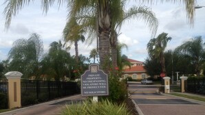 A private property sign with a no trespassing warning and a stop sign at the entrance. - Beautiful pool great location near to the beach. Special Prices for Nov and Dec! (Sarasota)