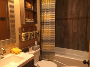 Combined shower/tub, hair dryer, towels, soap