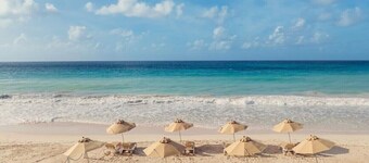 Pene’s Place • Tropical 2BR Condo with Pool • Steps to Beach!