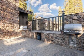 Enjoy a secure outdoor cooking experience with a grill area.