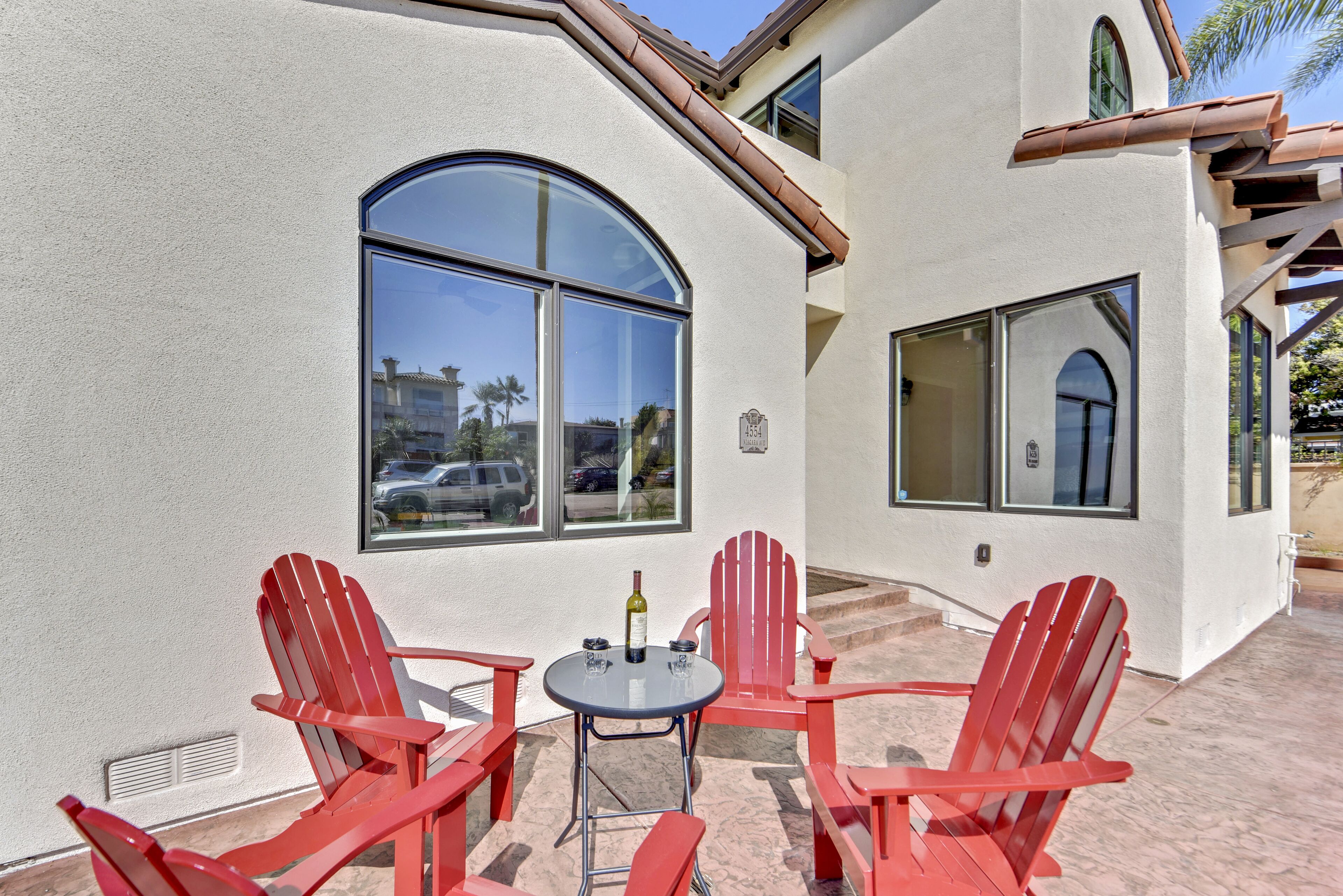 Outside front patio and great place to hose off sand from a day at the beach!
