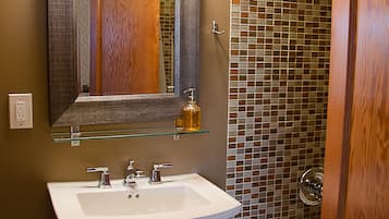 Bathtub, hair dryer, towels, soap