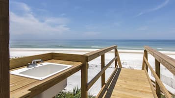 On the beach, sun loungers