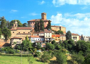A historic town with a prominent tower and traditional architecture.