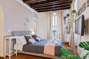 1 dormitorio, tabla de planchar con plancha, wifi y ropa de cama