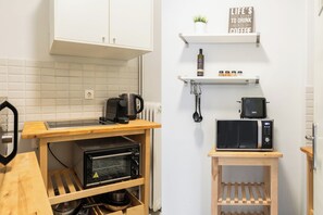 Appartement, 2 chambres | Cuisine privée | Réfrigérateur, four, plaque de cuisson, machine à expresso