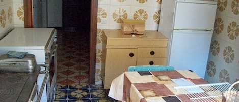 Fridge, stovetop, coffee/tea maker, cookware/dishes/utensils