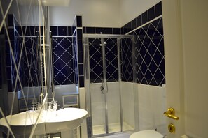 Shower, jetted tub, hair dryer, bidet