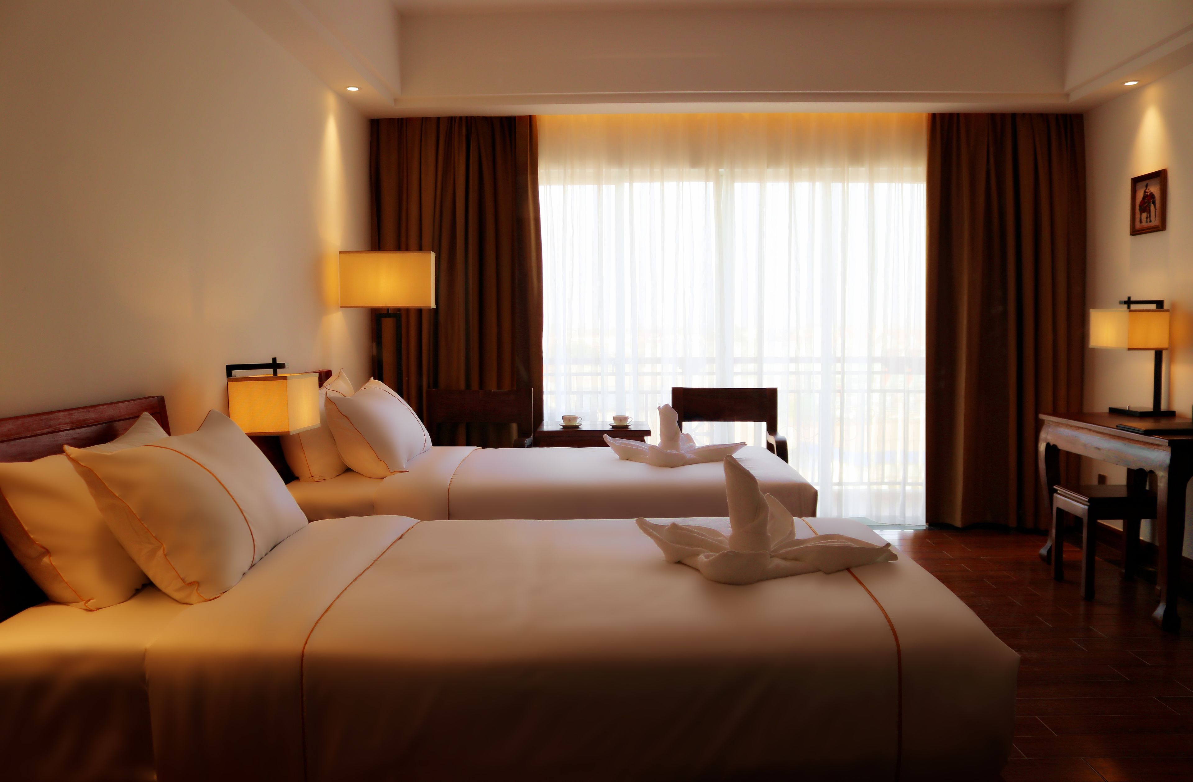 deluxe twin room with balcony | premium bedding, in-room safe, desk, soundproofing