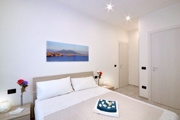 2 habitaciones, tabla de planchar con plancha, wifi y ropa de cama 