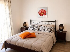 2 bedrooms, desk, iron/ironing board, travel crib