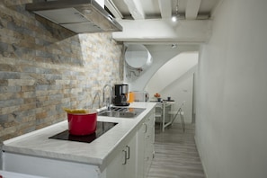 Fridge, microwave, stovetop, coffee/tea maker