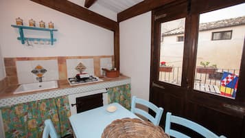 Fridge, stovetop, coffee/tea maker, toaster