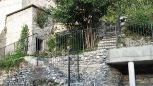 A stone staircase with metal railings leading up to a building. - COLOR WITH PANORAMA AND RENOVATED PARKING (Careno)