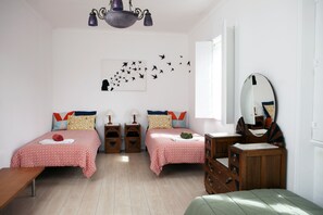 4 habitaciones, tabla de planchar con plancha, wifi y ropa de cama 