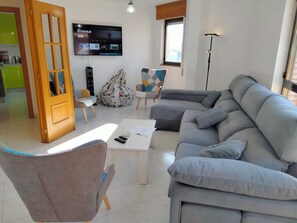 TV, DVD player, video library, stereo