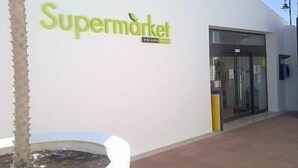 A supermarket with a clear entrance and a sign that reads "Supermarket." - 2 Bed Apartment On PGA Golf Course (Sucina)